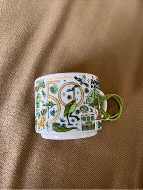 Disney Animal Kingdom Green and White Ceramic Mug Starbucks mini